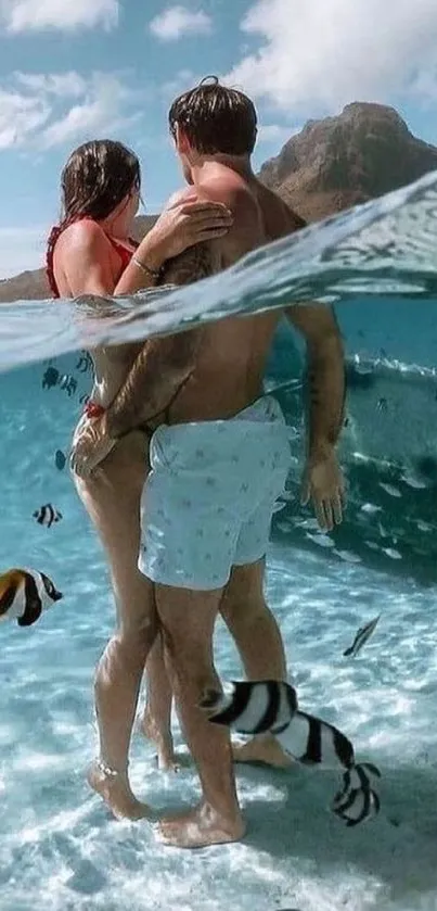 Romantic couple underwater in tropical paradise.