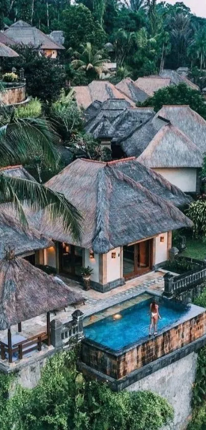 Tropical villa with pool and lush greenery.