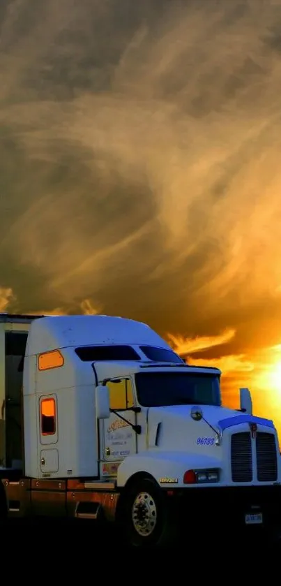 White truck under dramatic orange sunset sky.