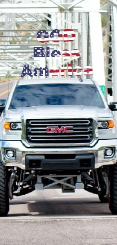 White truck crossing a scenic rural bridge.