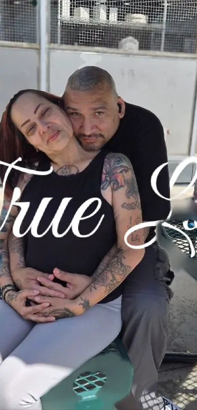 A couple embracing with 'True Love' text overlay.