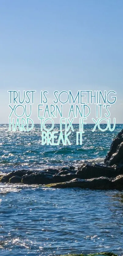 Ocean cliff with a trust quote, serene mobile wallpaper.