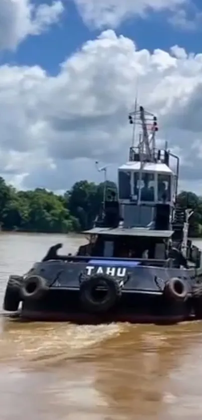 Tugboat navigating a calm river with lush greenery and a cloudy sky.