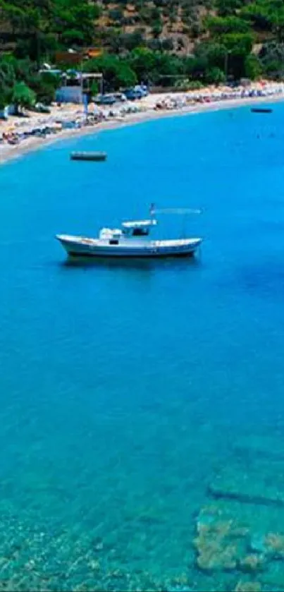 Turquoise beach with boat and lush surroundings.