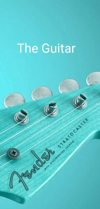 Aqua Fender guitar headstock on mobile wallpaper.