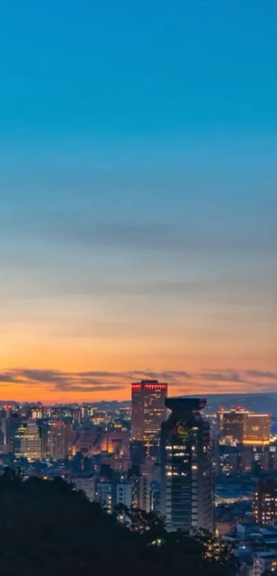 Twilight cityscape with a vibrant skyline under a colorful evening sky.