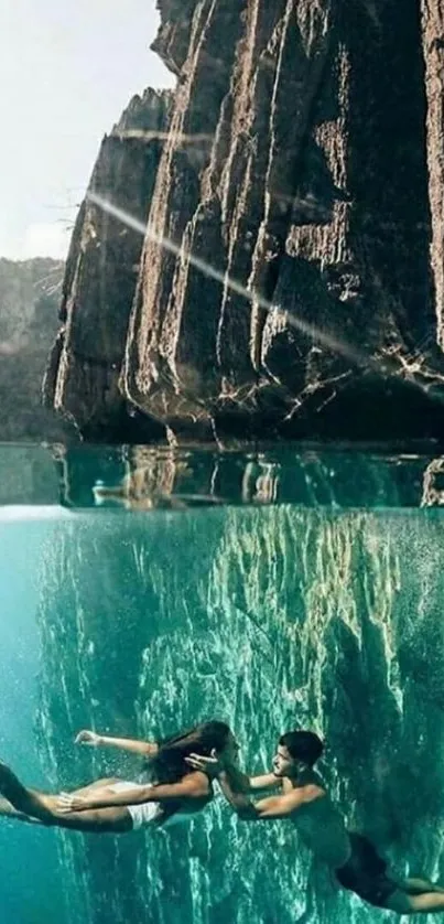 Couple swimming under a scenic cliff in turquoise waters.