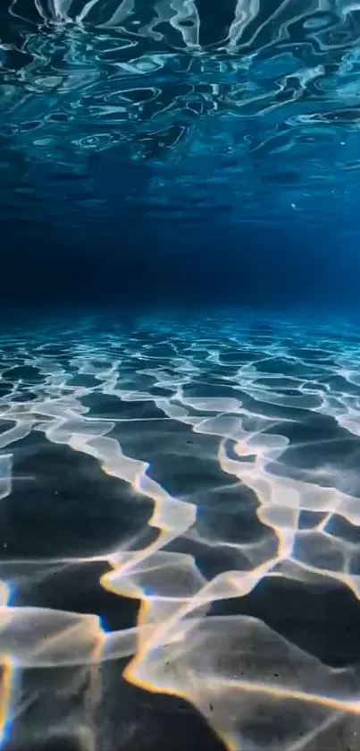 Serene underwater ocean scene with soft, rippling water patterns.