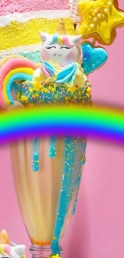 Vibrant unicorn milkshake with rainbow decoration on a pink background.