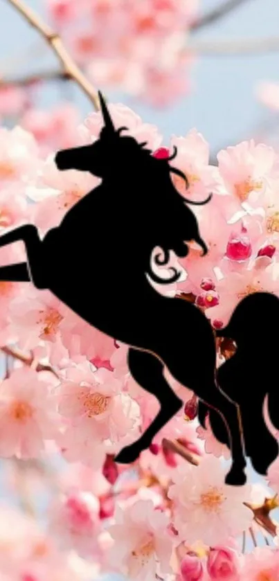 Silhouette of unicorn on cherry blossom background.