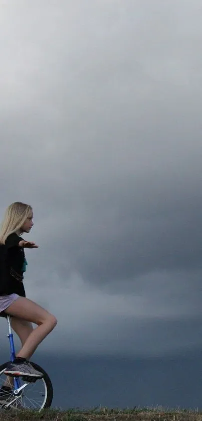 Woman on unicycle beneath dramatic cloudy sky, evokes balance and serenity.