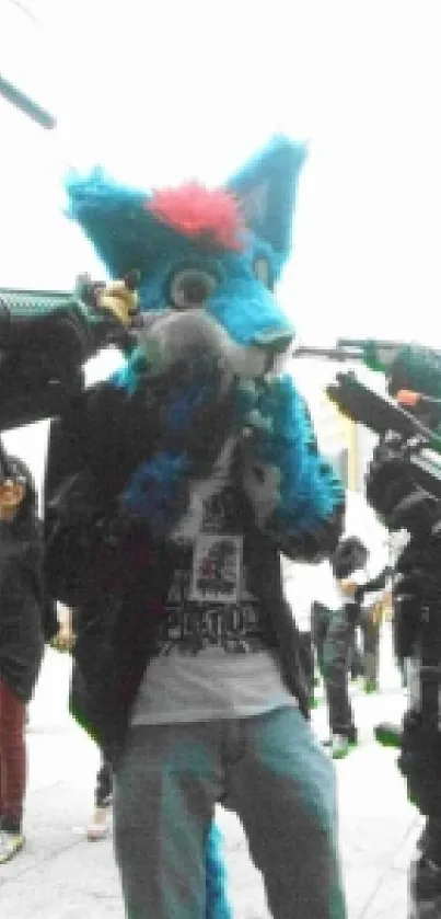 Blue fox mascot surrounded by onlookers in a dynamic cosplay scene.