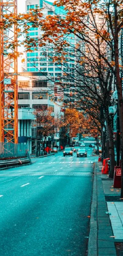 Urban street in autumn with vibrant blue tones and orange leaves.