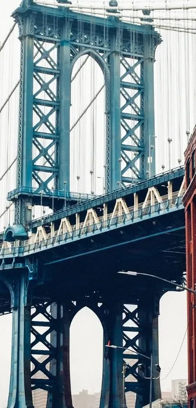 Wallpaper of a bridge with red brick buildings and urban cityscape.