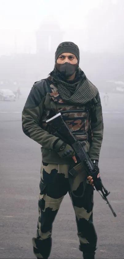 Soldier in urban camouflage with a rifle in a foggy city.