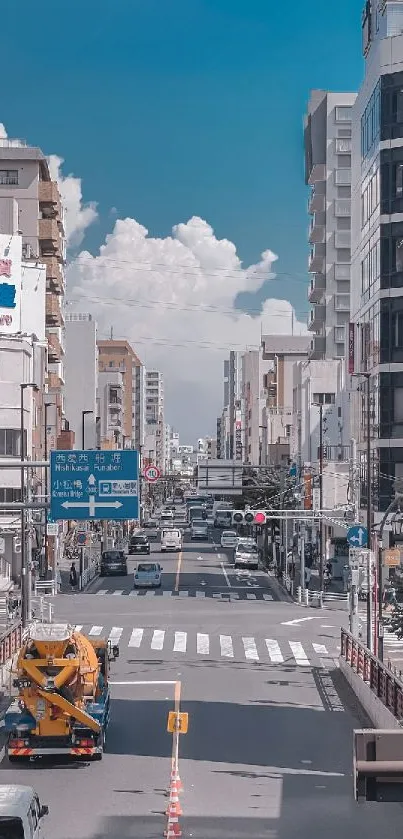 Urban city street with blue sky and buildings.
