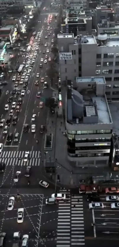 Aerial view of a city street with traffic during dusk.