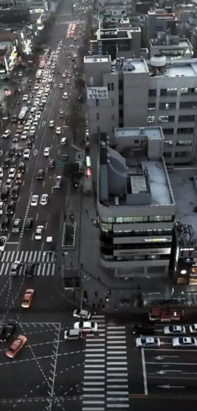 Aerial view of a bustling city street at dusk.