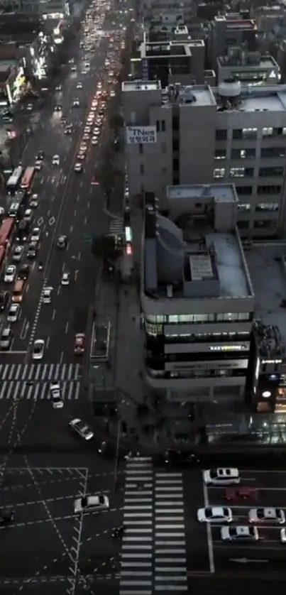 A vibrant urban evening cityscape shot from above.