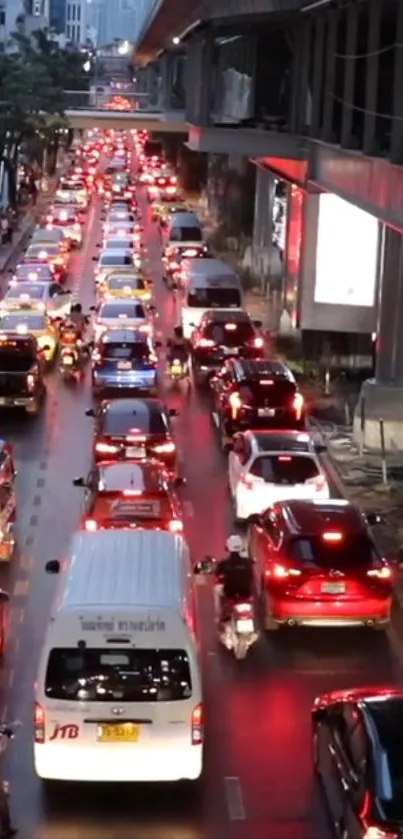 Evening urban traffic jam with city lights and busy street view.