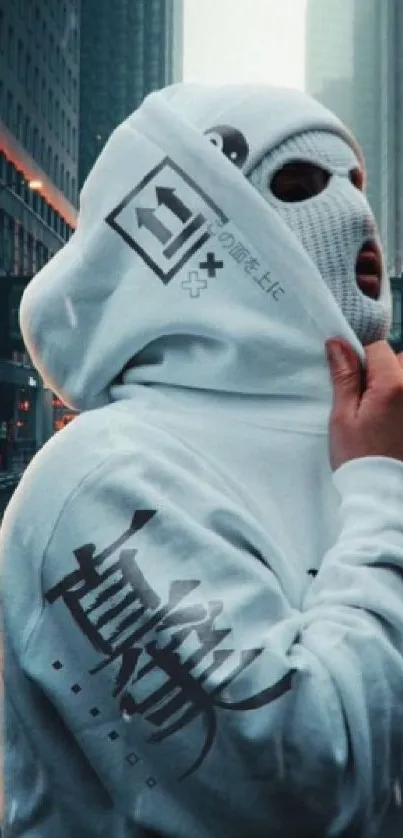 Person in white hoodie in a nighttime cityscape.