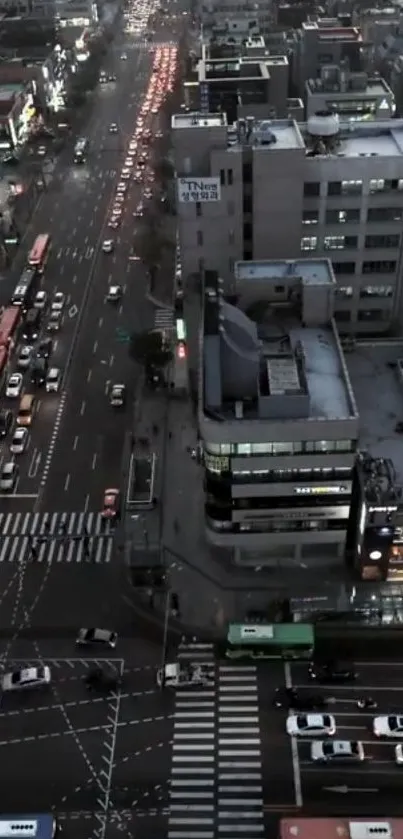 Aerial view of city streets with traffic at night.