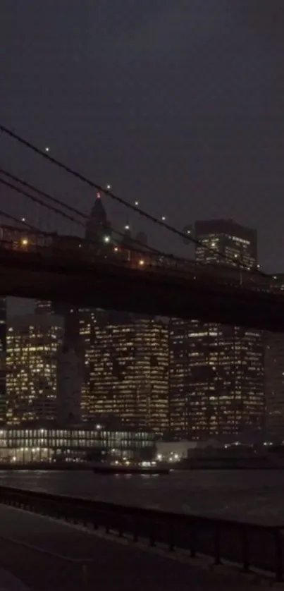 Nighttime urban cityscape with bridge and glowing lights.