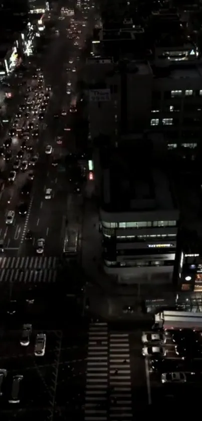 A vibrant urban night cityscape with busy traffic and illuminated buildings.