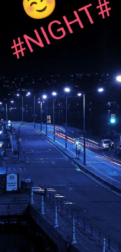 Urban night street with blue lights and a smiley face emoji.