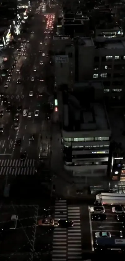 A bustling city street at night with vibrant lights and traffic.