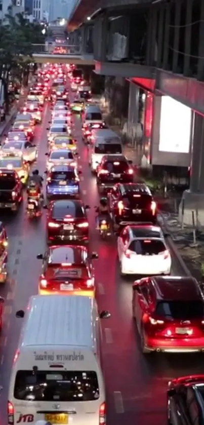 Nighttime traffic jam in a bustling city street.