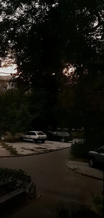 Urban nightscape with trees and buildings under a dark green sky.