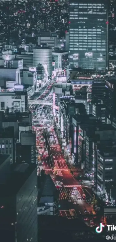 Nighttime cityscape with vibrant urban lights.