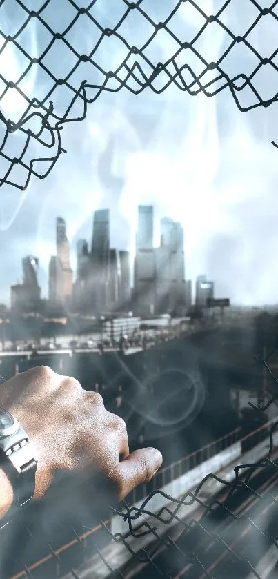 City skyline seen through a rustic fence with a hand in the foreground.