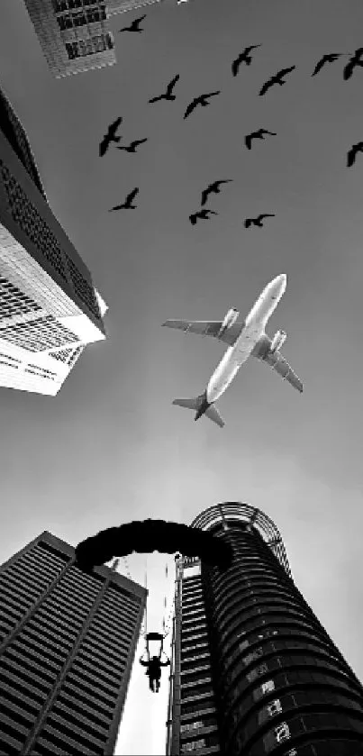 Black and white urban skyline with airplane and birds.