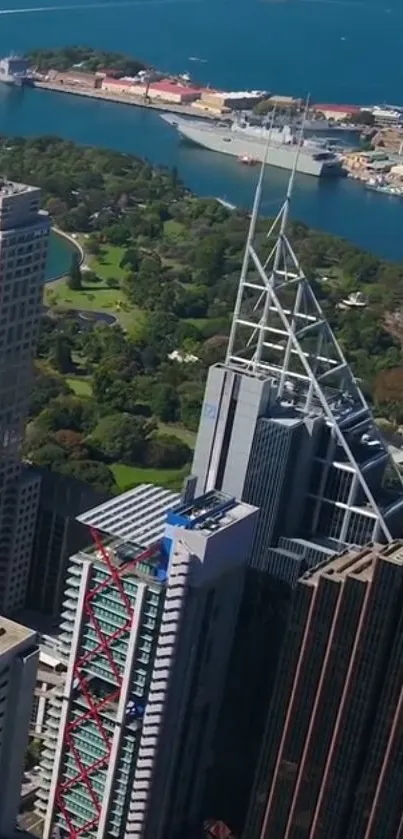 Aerial view of cityscape with skyscrapers and waterfront.