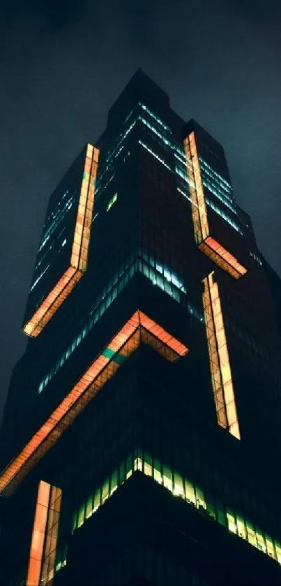 A towering skyscraper with glowing neon lights against a dark, moody night sky.