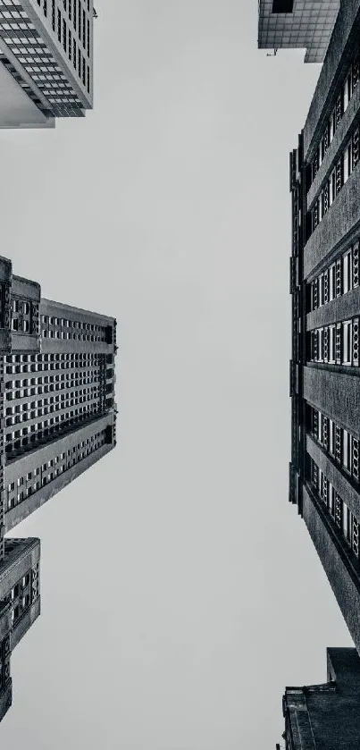 Monochrome view of skyscrapers reaching skyward in an urban cityscape.