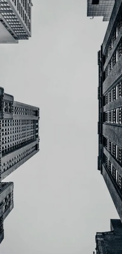 Dramatic urban skyscraper view against the sky, showcasing towering architecture.