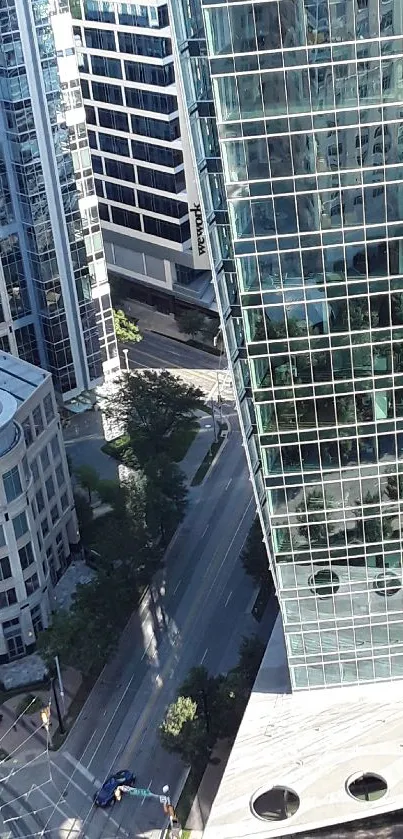 Aerial view of modern urban skyscrapers and city streets.