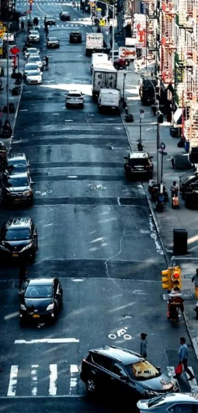 Lively urban street scene with cars and pedestrians.