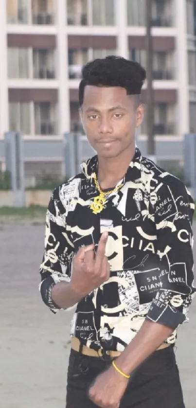 Young person in stylish patterned shirt with urban background.