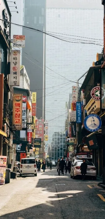 Bustling urban street with colorful signs and modern buildings.