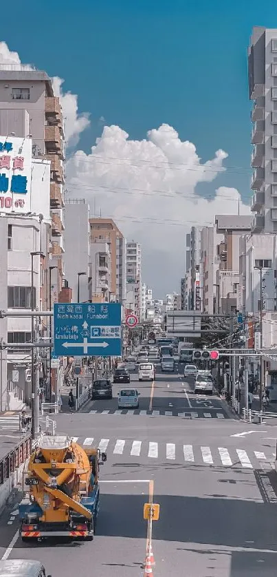 Urban street with blue sky and skyscrapers.