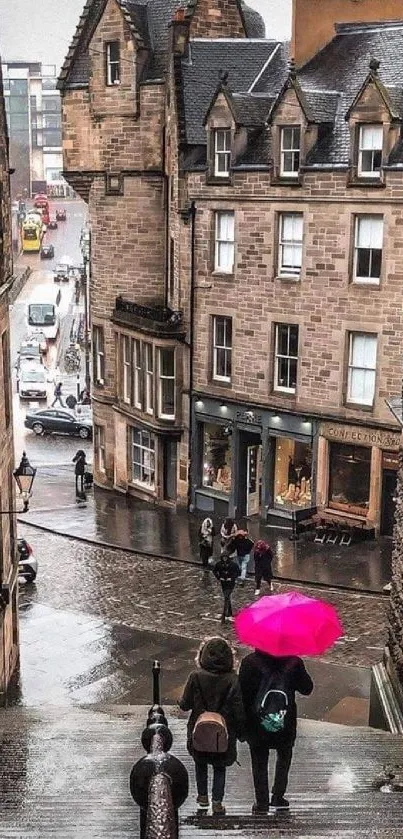 Urban street scene with pink umbrella, cobblestones, and historic buildings.