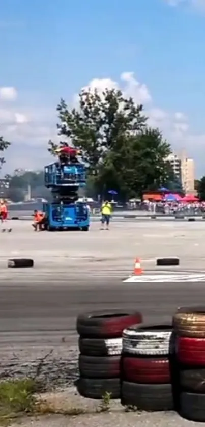 Daredevil stunt in urban arena with aerial lift and city skyline.