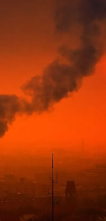 Sunset over city skyline with smoke trail in an orange-red sky.