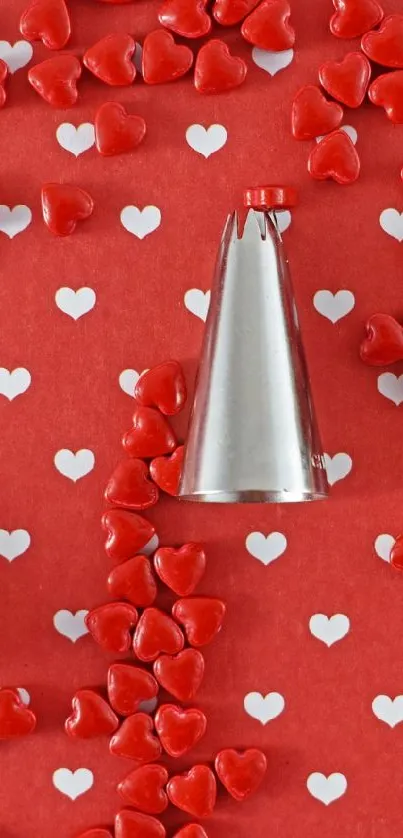 Red wallpaper with hearts and metallic cones on a Valentine's theme.