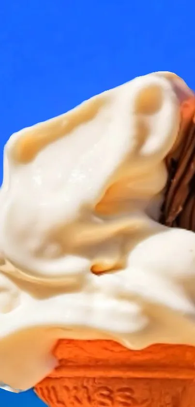 Vanilla ice cream cone with chocolate in a blue sky background.