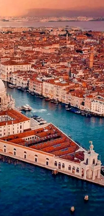 Venetian cityscape with canals and historic buildings in sunset light.